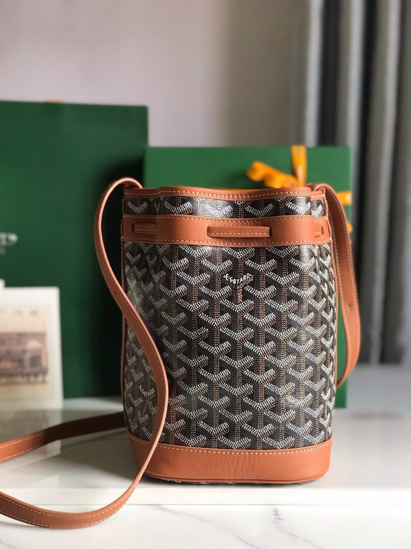 PETIT FLOT BUCKET BAG 22 IN BLACK GOYARDINE CANVAS AND TAN LAMBSKIN TRIM