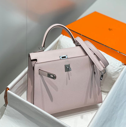 KELLY 25CM IN EPSOM MAUVE SWIFT CALFSKIN SILVER HARDWARE