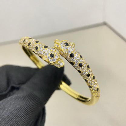 [AURORA]PANTHERE DOUBLE HEADED HALF DIAMOND OPEN BRACELET