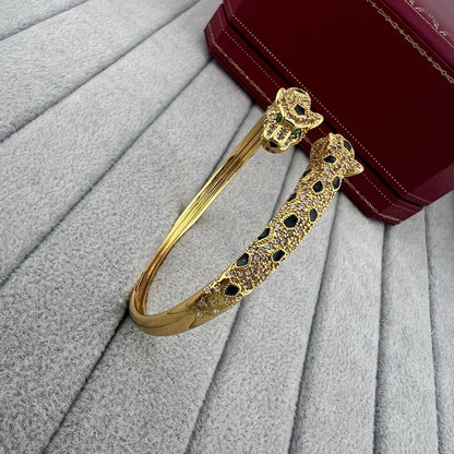 [AURORA]PANTHERE DOUBLE HEADED HALF DIAMOND OPEN BRACELET