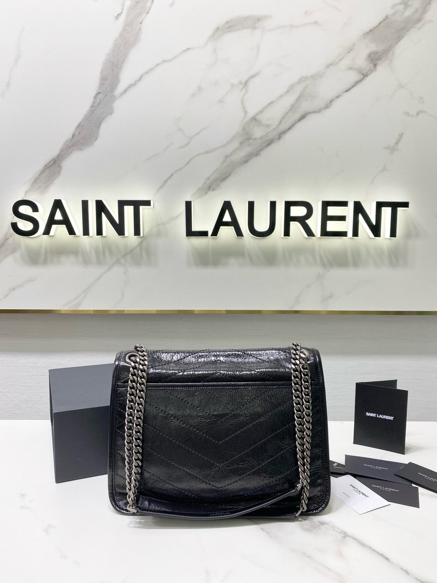 MEDIUM NIKI 28 IN BLACK CALFSKIN CHAIN BAG High-end