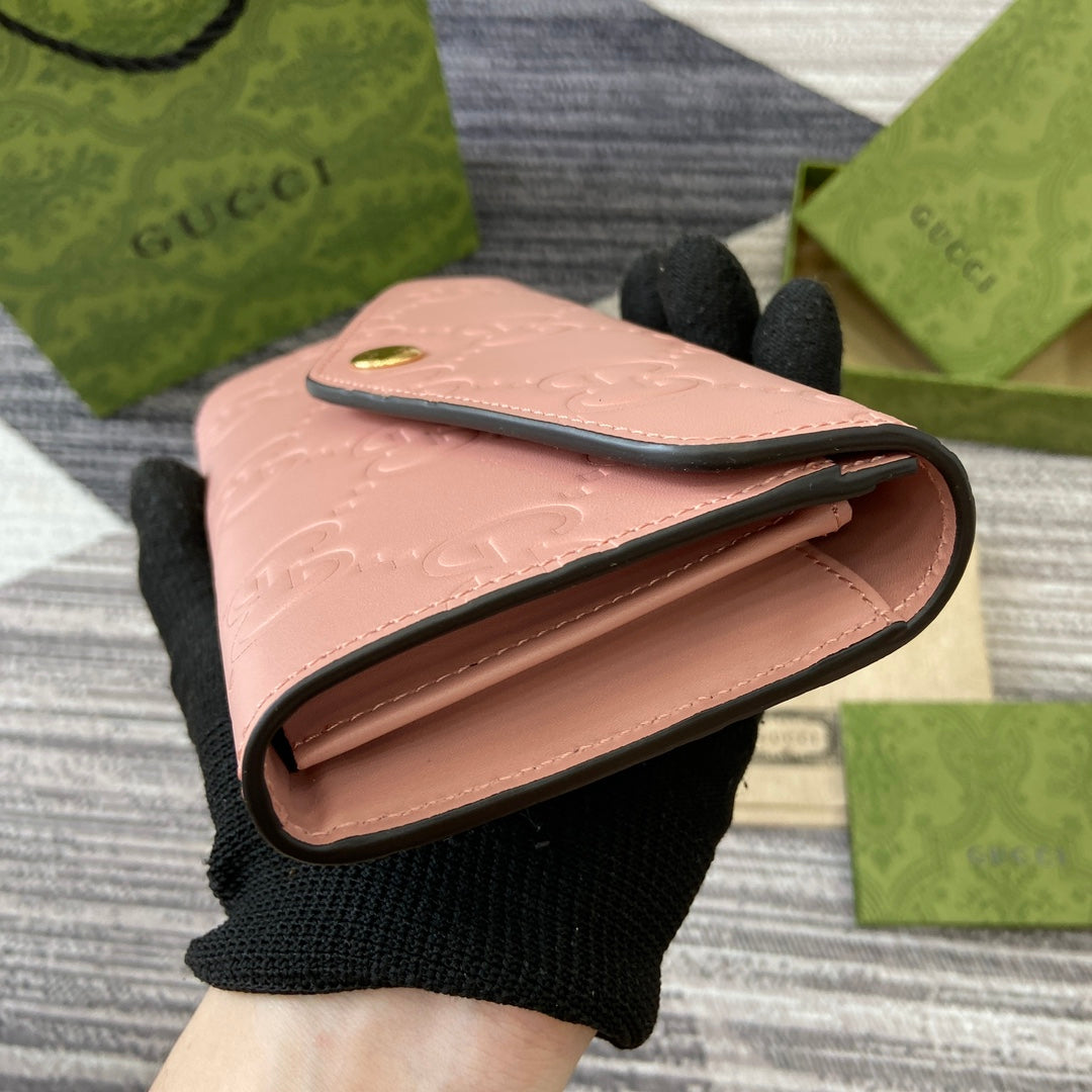 CONTINENTAL WALLET 19 IN PINK EMBOSSED CALFSKIN GOLD HARDWARE
