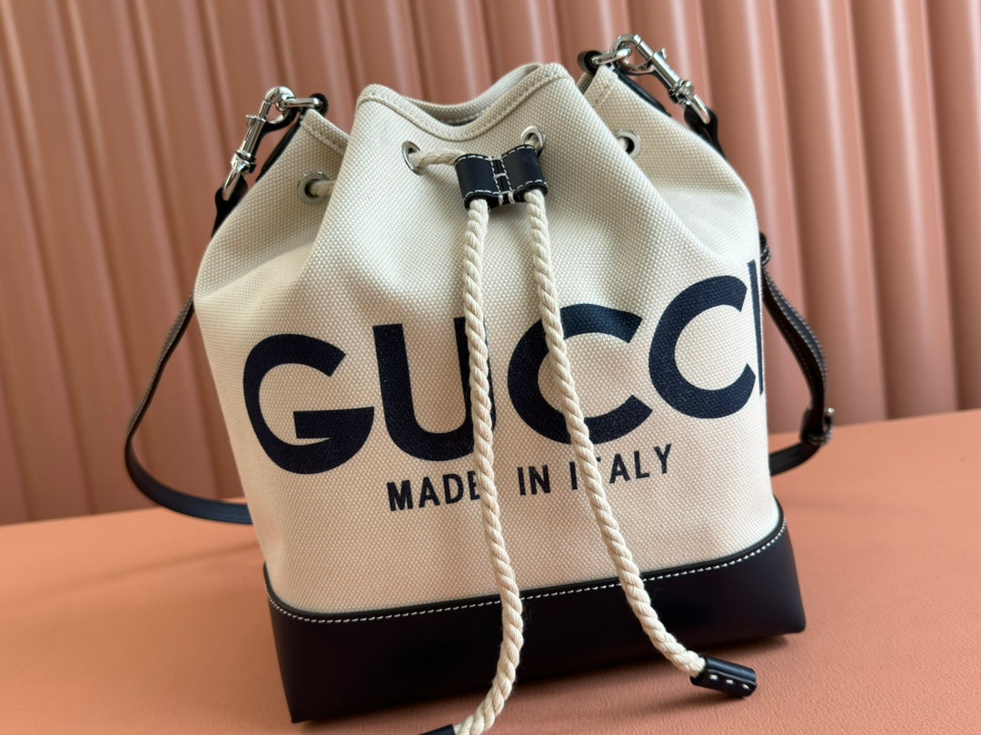 DRAWSTRING SHOULDER BAG LOGO PRINT 31 IN WHITE CANVAS DARK BLUE CALFSKIN